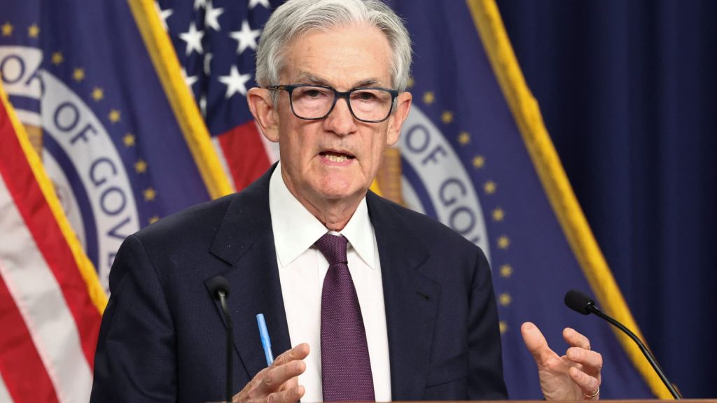 Fed leaves rates unchanged, defying Trump’s demands for aggressive cuts